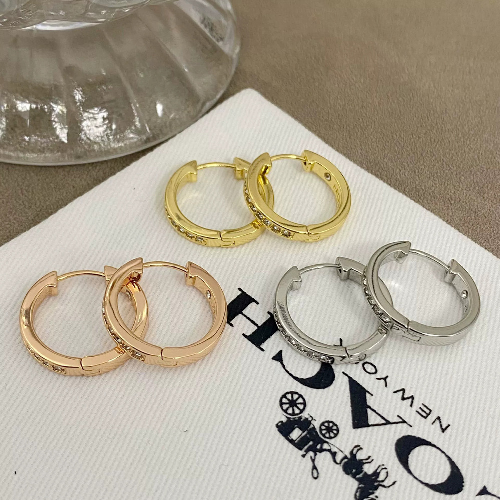 Coach Zircon Stud Earrings Metal